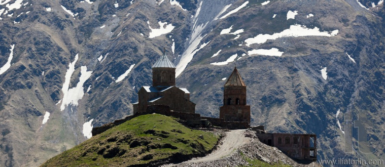 Gergeti Trinity Church and Caucasus Mountains. Stepantsminda. Georgia.