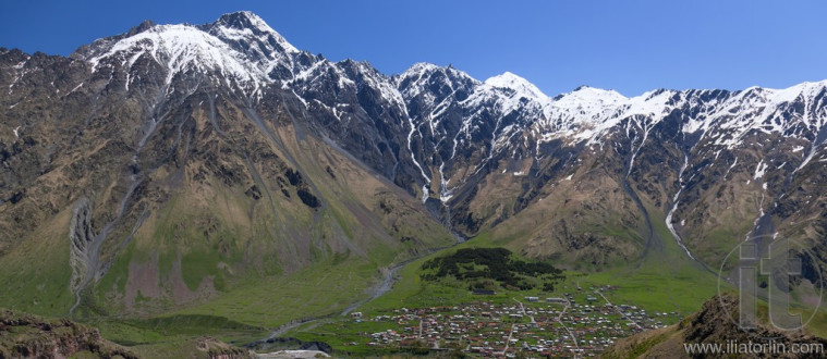 Caucasus Mountains and Stepantsminda village. Georgia.