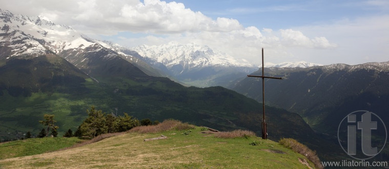 Summit marked with cross above Mestia village. Upper Svaneti. Georgia