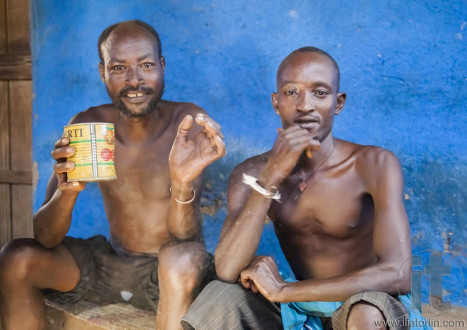 Men from Dassanech tribe drink in village bar. Omorato, Ethiopia